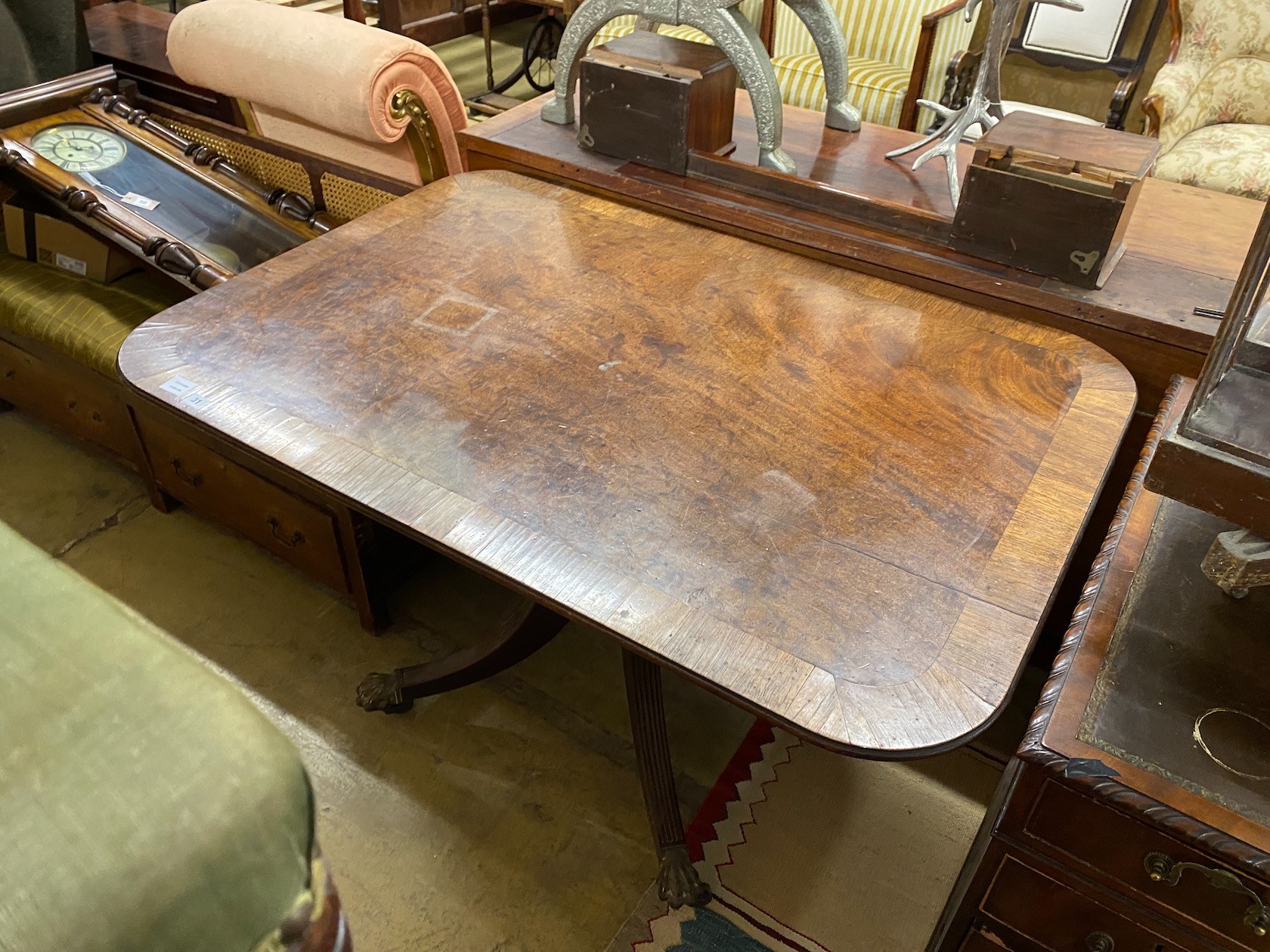 A Regency rectangular rosewood crossbanded mahogany tilt top breakfast table, width 128cm, depth 88cm, height 74cm